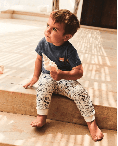 boy model in safari animals trousers